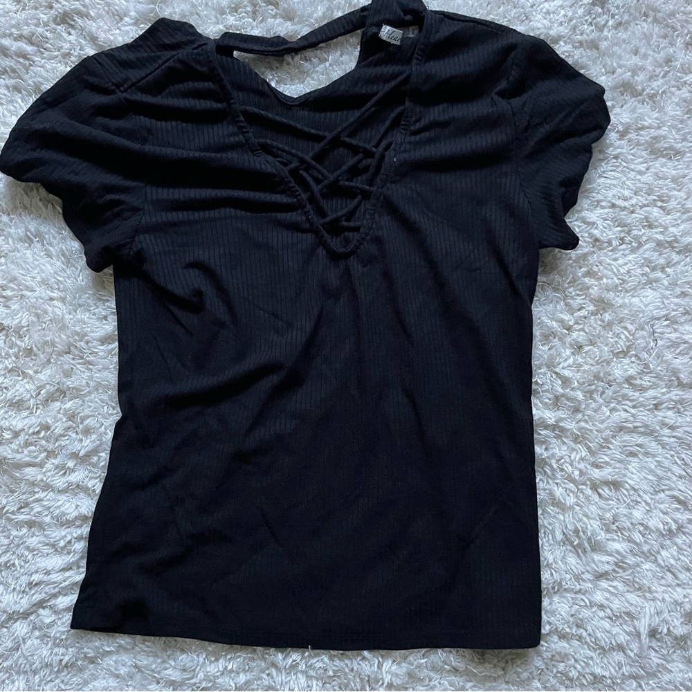 Black short sleeved shirt.